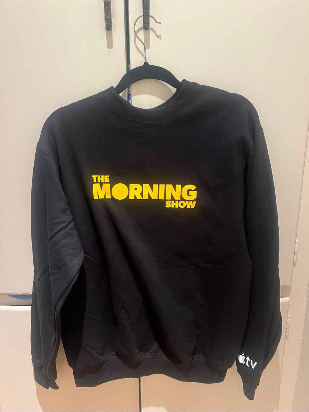 The Morning Show Black Crewneck Sweatshirt with Yellow Logo
